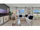 Spacious living room featuring a sectional sofa and large windows at 2974 Salisbury Ave, Haines City, FL 33844