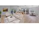 Bright living room with an open floorplan, modern furniture, and stainless steel appliances at 326 Morning Creek Cir, Apopka, FL 32712