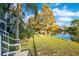Backyard with pond view and lush landscaping at 3714 Palm Desert Ln # 5317, Orlando, FL 32839