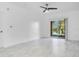 Bright bedroom with sliding door to balcony at 3714 Palm Desert Ln # 5317, Orlando, FL 32839