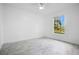 Bright bedroom with large window overlooking a lake at 3714 Palm Desert Ln # 5317, Orlando, FL 32839