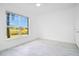 Bright bedroom with large windows and tile floors at 3714 Palm Desert Ln # 5317, Orlando, FL 32839