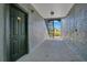 Building entrance with dark green door and stairs at 3714 Palm Desert Ln # 5317, Orlando, FL 32839