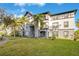 Two-story apartment building with landscaping and parking at 3714 Palm Desert Ln # 5317, Orlando, FL 32839