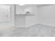 Kitchen with white cabinets and a breakfast bar at 3714 Palm Desert Ln # 5317, Orlando, FL 32839