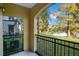 Covered patio overlooking a tranquil pond at 3714 Palm Desert Ln # 5317, Orlando, FL 32839