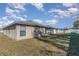 Spacious backyard with patio and fenced yard at 3829 Arborvitae Way, Deland, FL 32724