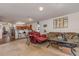 Open-concept living room with a view of the kitchen at 3829 Arborvitae Way, Deland, FL 32724