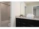 Bathroom with double vanity and shower/tub combo at 4298 Lana Ave, Davenport, FL 33897
