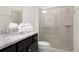 Bathroom with a walk-in shower and granite countertop at 4298 Lana Ave, Davenport, FL 33897