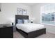 Bedroom with a queen bed and window coverings at 4298 Lana Ave, Davenport, FL 33897