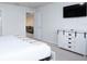 Bedroom with a king-size bed, and access to a loft area at 4298 Lana Ave, Davenport, FL 33897