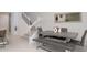 Bright dining area features a rustic table with bench seating at 4298 Lana Ave, Davenport, FL 33897