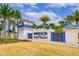 Entrance to Windsor Island Resort, featuring a guardhouse and landscaping at 4298 Lana Ave, Davenport, FL 33897