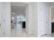 View through the entryway to the living room and kitchen at 4298 Lana Ave, Davenport, FL 33897