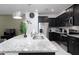 Modern kitchen with stainless steel appliances and granite countertops at 4298 Lana Ave, Davenport, FL 33897
