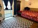 Bedroom with a king-size bed and access to balcony at 5123 Picadilly Circus Ct # 2, Orlando, FL 32839