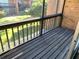 Screened porch with wooden deck and backyard view at 5123 Picadilly Circus Ct # 2, Orlando, FL 32839