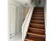 Staircase with wood-look laminate treads at 5123 Picadilly Circus Ct # 2, Orlando, FL 32839