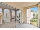 Spacious balcony with sliding glass doors and architectural arches, offering neighborhood views at 542 Orange Dr # 22, Altamonte Springs, FL 32701