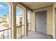 Cozy balcony with arched openings showcasing views of trees and building exterior at 542 Orange Dr # 22, Altamonte Springs, FL 32701