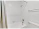 Clean, white tiled bath and shower with modern fixtures and a shower curtain at 542 Orange Dr # 22, Altamonte Springs, FL 32701