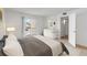 Cozy bedroom with balcony access, white dresser, and closet for ample storage at 542 Orange Dr # 22, Altamonte Springs, FL 32701