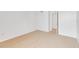 Neutral bedroom with carpet, a large window for natural light and closet access at 542 Orange Dr # 22, Altamonte Springs, FL 32701