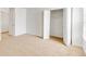 Bright bedroom featuring neutral carpet, white walls, and spacious closet with folding doors at 542 Orange Dr # 22, Altamonte Springs, FL 32701