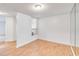 Sunlit bedroom features hardwood floors, neutral walls, and a large mirrored closet at 542 Orange Dr # 22, Altamonte Springs, FL 32701