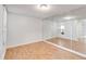 Bright bedroom with wood floors and wall mirrors at 542 Orange Dr # 22, Altamonte Springs, FL 32701