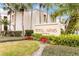 Welcome to Royal Arms Condominiums, featuring lush landscaping and a charming entrance at 542 Orange Dr # 22, Altamonte Springs, FL 32701