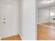 View of the unit's entrance and interior, including mirrored wall accents at 542 Orange Dr # 22, Altamonte Springs, FL 32701