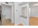 Entryway with coat closet and pass-through window to the kitchen area at 542 Orange Dr # 22, Altamonte Springs, FL 32701