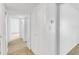 Hallway featuring carpeting and access to multiple rooms and closet spaces at 542 Orange Dr # 22, Altamonte Springs, FL 32701