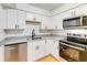 Updated kitchen with stainless steel appliances, granite countertops, and new cabinets at 542 Orange Dr # 22, Altamonte Springs, FL 32701