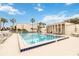 Community pool featuring poolside seating and sunny skies at 542 Orange Dr # 22, Altamonte Springs, FL 32701