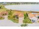 Aerial view of home near lake at 5521 Hogan Ln, Winter Haven, FL 33884