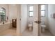 Bathroom with two toilets and access to Primary bath at 5521 Hogan Ln, Winter Haven, FL 33884