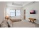 Bedroom with two twin beds and large windows at 5521 Hogan Ln, Winter Haven, FL 33884