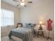 Bright bedroom with a double bed and window at 5521 Hogan Ln, Winter Haven, FL 33884