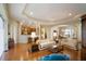 Spacious living room features hardwood floors, ample natural light, and comfortable seating at 5521 Hogan Ln, Winter Haven, FL 33884