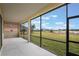 Screened patio overlooking a lake at 5521 Hogan Ln, Winter Haven, FL 33884