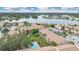 Aerial view of a community with lake, pool, and parking at 570 Orange Dr # 54, Altamonte Springs, FL 32701