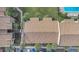 Aerial view of condo complex with pool and lush landscaping at 570 Orange Dr # 54, Altamonte Springs, FL 32701