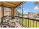 Private screened balcony overlooking water and landscape at 570 Orange Dr # 54, Altamonte Springs, FL 32701