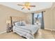 Bright bedroom with water views and ceiling fan at 570 Orange Dr # 54, Altamonte Springs, FL 32701