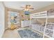 Cozy bedroom with a bunk bed, dresser, and playful decor at 570 Orange Dr # 54, Altamonte Springs, FL 32701