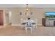 Bright dining area with a small table and chairs at 570 Orange Dr # 54, Altamonte Springs, FL 32701