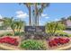 Landscaped entrance to Sandy Cove Condominiums at 570 Orange Dr # 54, Altamonte Springs, FL 32701